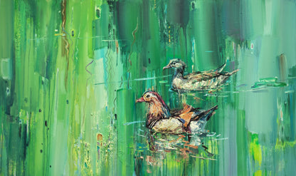 Ducks Gliding on Emerald Waters